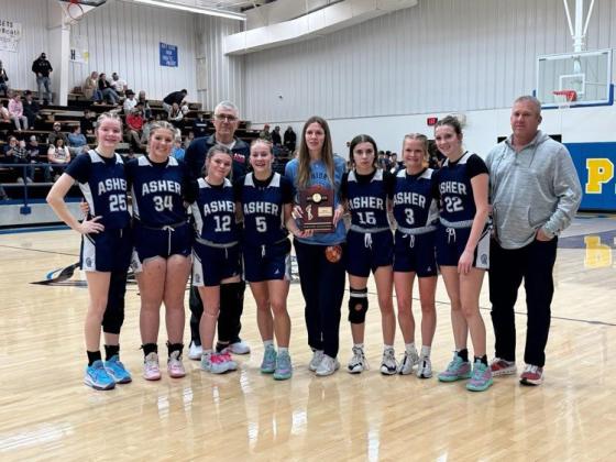 The Asher Lady Indians are Class B District Champions after playing last weekend. On Feb. 14, they beat Bokoshe, 69-20, and on Feb. 15, they triumphed over Moss, 52-43. They move on to the Regional Tournament in Moss on Feb. 21 at 6 pm. Photo provided.