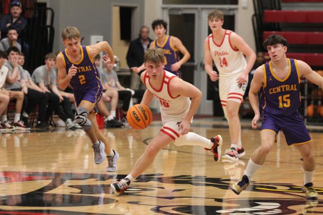 Dale senior Levi Kelly takes the ball to Pirate territory during the Class 2A Regional home game against Central (Sallisaw) on Feb. 24. The Pirates won, 83-43, and will advance to the area tournament on Feb. 28 in McAlester at 7:30 pm. Countywide &amp; Sun/Natasha Dunagan