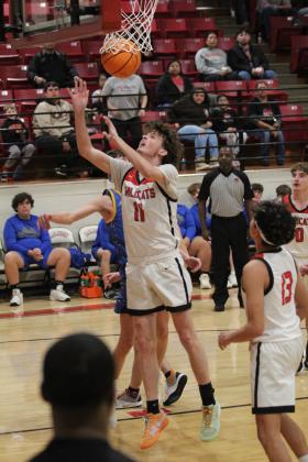 Earlsboro senior Gage Brown adds two points to the score in the last regular season home game against Moss on Feb. 10. The Wildcats won, 69-50, and will play in the District tournament in Sasakwa, Feb. 14-15. Countywide &amp; Sun/Natasha Dunagan