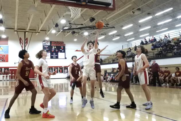 McLoud senior Mason Craven shoots for the bucket during the Class 4A Distict home game against Byng on Feb. 22. The Redskins lost that game, 47-51, but will play in the consolation bracket of regionals in McLoud at 2:30 today (Feb. 27). Countywide &amp; Sun/Suzie Campbell