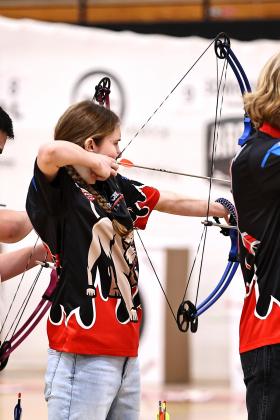 North Rock Creek's archery team finished 1st place in the McLoud Tournament. The top 3 archers for the NRC team were Kadence Munn, Jack VanAntwerp, and Courtney Grace. Pictured above is Kadence Munn who shot a 287. Photo courtesy of Gowin Photography