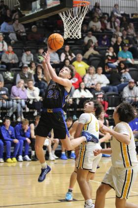 Bethel junior Darius Cheatham goes to the hoop during the Feb. 7 homecoming game at Tecumseh. The Savages won a hard-fought game, 54-49, in overtime. Countywide &amp; Sun/Natasha Dunagan