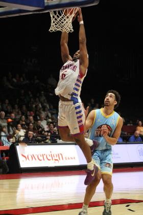 Potawatomi Fire Guard Jaylen Mahone tries for a slam dunk during the fourth quarter. Natasha Dunagan, Countywide &amp; Sun