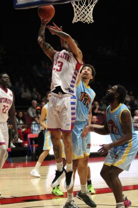 Potawatomi Fire Forward Isaiah Wade tries for a layup and draws the foul during the fourth quarter of the March 23 home game with the San Antonio Clutch. The Fire won, 133-99. Natasha Dunagan, Countywide &amp; Sun