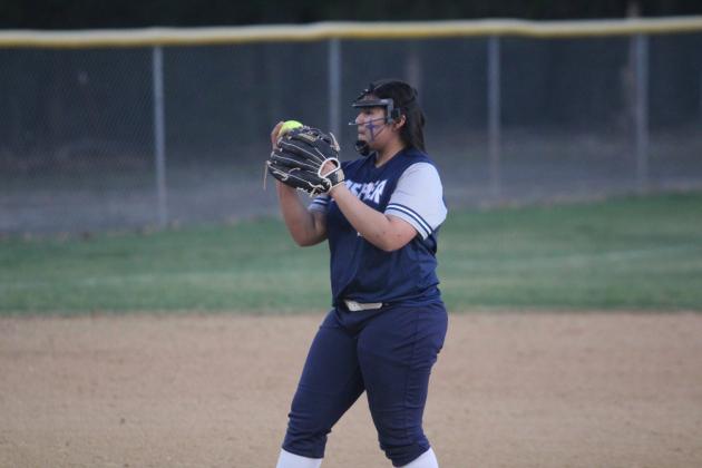 During the third inning of one game, Asher freshman Raina Timms concentrates on her slow pitch against a Wewoka batter during the March 7 double header. The Lady Indians won both games, 15-0 and 18-3. Countywide &amp; Sun/Natasha Dunagan
