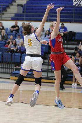 Bethel sophomore Kinley Bowles adds two points to the board in the fourth quarter of the Class 3A Regional Tournament game with Chandler on Feb. 27. The Lady Wildcats won, 52-44, but lost their second regional game against Washington on March 1, 30-74. They will begin area play against Atoka in Ada today (March 6) at 6 pm. Countywide &amp; Sun/Natasha Dunagan