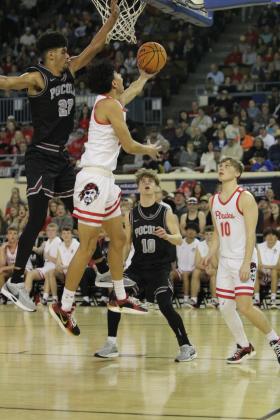 In the fourth quarter, Dale sophomore Keldan Meely puts in a layup against Pocola, as senior Levi Kelly looks on, during the Class 2A Basketball State Championship on March 8 at the State Fair Arena.  Natasha Dunagan, Countywide &amp; Sun