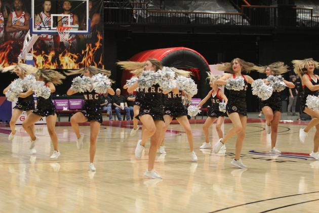 Both the North Rock Creek High School Pom Squad, shown, and the Shawnee Pom Squad performed during halftime of the March 14 home game between the Potawatomi Fire and the Enid Outlaws.Natasha Dunagan, Countywide &amp; Sun
