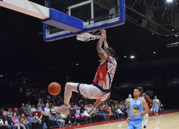 Isaiah Wade slams one in during the season opener of the Potawatomi Fire game, Mar. 8. The Fire won 116-81 against the Western Oklahoma Sky Kings.