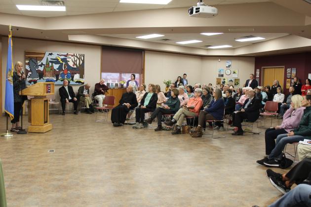 Author and daughter of the late author Tony Hillerman, Anne Hillerman, speaks to a crowd of at least 80 people at Shawnee Public Library on March 15 for an Oklahoma Literary Sites Register plaque dedication.