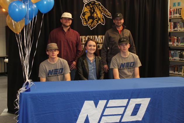 Tecumseh seniors Lane Steward and Austin Ramsey signed letters of intent on Feb. 25 for livestock judging at Northeastern Oklahoma A&amp;M College in Miami. They are shown with NEO Livestock Judging Coach Mattie Haynes, center, THS Livestock Judging Coach Corey Pell and FFA Advisor Dodge Nichols. Pell said they have only had two other students to sign for livestock judging two years ago. "They have certainly put in the work to do it," said Pell of Steward and Ramsey. Countywide &amp; Sun/Natasha Dunagan