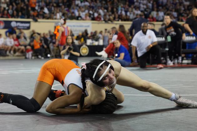 Tecumseh senior Vivian Hayes works on her opponent in the 105 weight division of the OSSAA Class 5A Girls Wrestling State Championship on March 1 at the State Fair Arena. Hayes is the first girls wrestling state champion for Tecumseh High School. Photo provided.