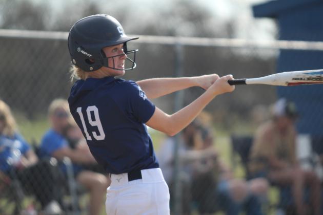 Shawnee's Jalee Reeves gets a hit at bat during the slow pitch game against Bethel on March 27. Natasha Dunagan, Countywide &amp; Sun