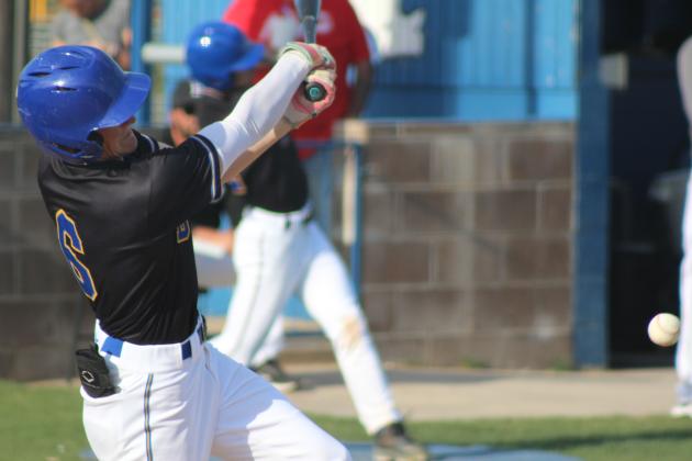 Bethel junior Zack Jennings sends the ball flying for a double during a double header home game against Tecumseh on April 17. The Savages won both games, 3-12 and 1-12. Natasha Dunagan, Countywide &amp; Sun