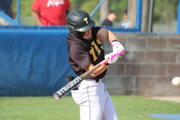 Tecumseh senior Caleb Sparks hits a single during the double header at Bethel on April 17. The Savages won both games, 3-12 and 1-12. Natasha Dunagan, Countywide &amp; Sun