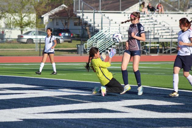 Shawnee freshman Gemma LaPlant gets the ball to the goal, but her shot is stopped by the goalie. Natasha Dunagan, Countywide &amp; Sun