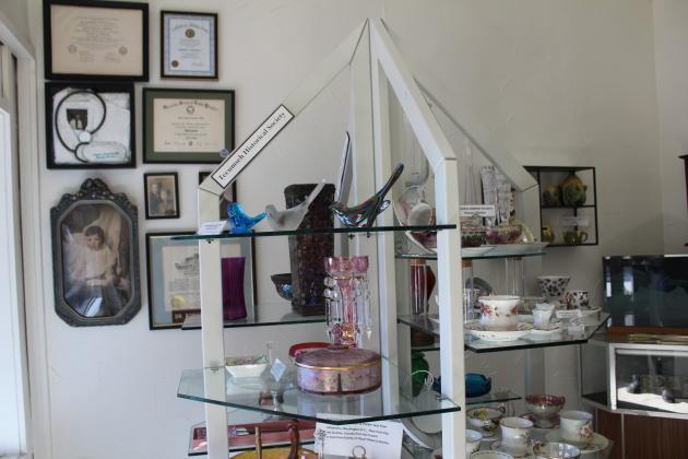 Dr. Robert Zumwalt display, teacups and glassware at the Tecumseh Museum