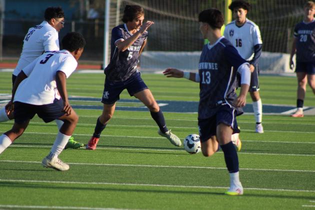 Shawnee senior Gage Karner dribbles the ball down the field during the April 8 home game with Nathan Hale. The Wolves won, 2-0. Natasha Dunagan, Countywide &amp; Sun