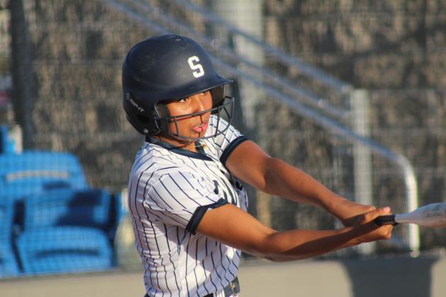 Shawnee's Amiyah Briones hits a single in the game against Dale on April 15. This is Shawnee's first year to have slow pitch softball in the spring, although they have had fast pitch in the fall before. Hosting a triple header, the Lady Wolves lost to the Lady Pirates, 0-12, and to the Lady Wildcats, 0-14. Natasha Dunagan, Countywide &amp; Sun