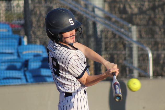 Shawnee's Jalee Reeves hits a single in the game against Dale on April 15. This is Shawnee's first year to have slow pitch softball in the spring, although they have had fast pitch in the fall before. Hosting a triple header, the Lady Wolves lost to the Lady Pirates, 0-12, and to the Lady Wildcats, 0-14. Natasha Dunagan, Countywide &amp; Sun