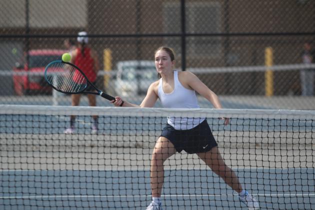 Shawnee junior Anndrea Parada tries for a forehand stroke in the #2 Doubles match during the East/West Quad Tournament. Natasha Dunagan, Countywide &amp; Sun