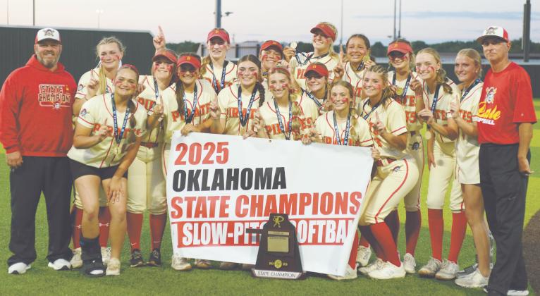 The Dale Lady Pirates Slow Pitch Team poses with Assistant Coach Eric Muncy, far left, and Head Coach Andy Powell, far right,  after winning the Class 4A State Championship at FireLake Ball Fields on May 8. They won all three games - with Calera, 12-1; Haskell, 4-1; and, Pocola, 11-10. Photo courtesy of Brian Blancett, Lincoln County News
