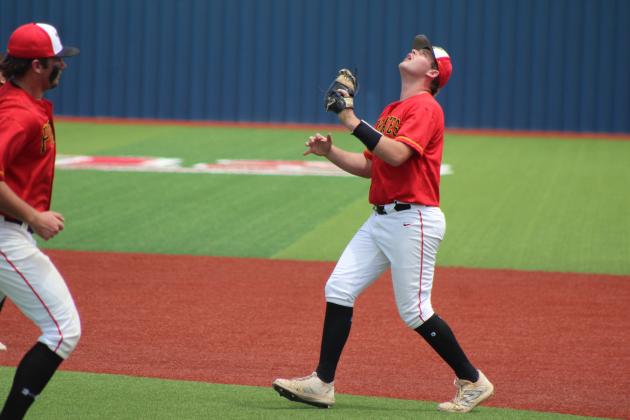 Dale junior A.J. Carpenter prepares to make the catch at first during the seventh inning of the May 15 Class 2A State Quarterfinal game with Oktaha, held at Seminole State College's Lloyd Simmons Field. The Pirates lost, 6-10, ending their season with a record of 28-5.