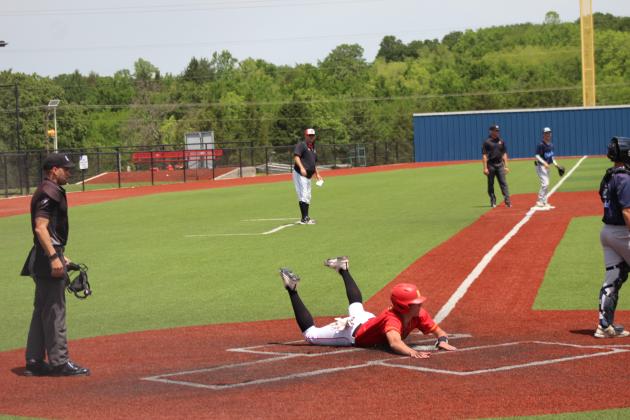 Dale senior Jett Higdon dives across home in the fourth inning of the May 15 Class 2A State Quarterfinal game with Oktaha, held at Seminole State College's Lloyd Simmons Field. The Pirates lost, 6-10, ending their season with a record of 28-5.