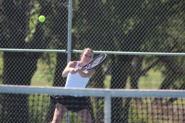 Tecumseh's Amanda Magill makes a two-handed stroke during a triangular meet with Skiatook, on the morning of April 21. Tecumseh played Byng that afternoon. Both boys and girls won against Skiatook and lost to Byng in all divisions. Natasha Dunagan, Countywide &amp; Sun