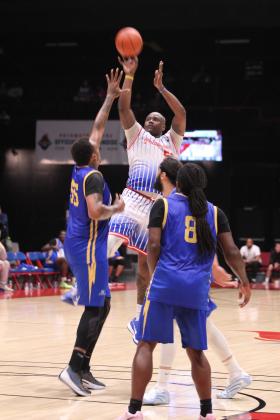 Paul Harrison shoots for two.