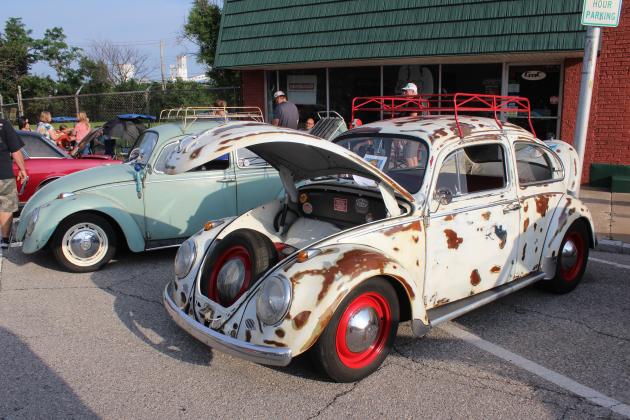 A 1962 Volkswagen Beetle, owned by Les Clift, and a 1966 VW Beetle, owned by Richard Abney, were among the vehicles at the Downtown Auto at Sundown Car Show in Shawnee on June 14.