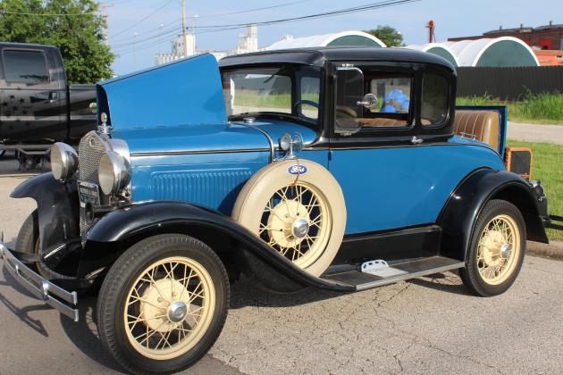 A 1930 Ford Model A, owned by Joe Scheidt, stands out at the Downtown Auto at Sundown Car Show in Shawnee on June 14.