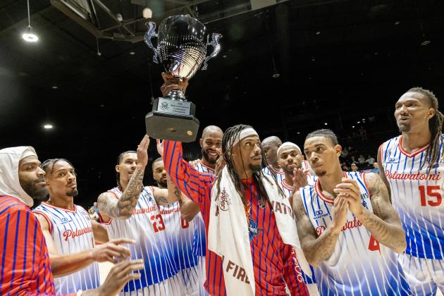 Ricky Artis II holds up the Midwest/Central Conference Championship trophy after the Potawatomi Fire beat the Logansport Iron Horses in a second game, 134-109, on June 7. They will move on to the Western Regional Finals against Great Falls Electric, June 12 (away) and June 15 (FireLake Arena). Photo courtesy of Kent Bush, CPN