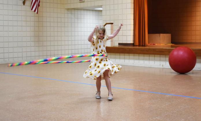 Lillian Carner takes a turn hula hooping during the Inspyral Circus event at Tecumseh Public Library on June 12. The next event in Tecumseh is the "Get Moving: Walk the Park Series" on June 24 at 10 am. Visit the Pioneer Library System website for the full calendar of events.
