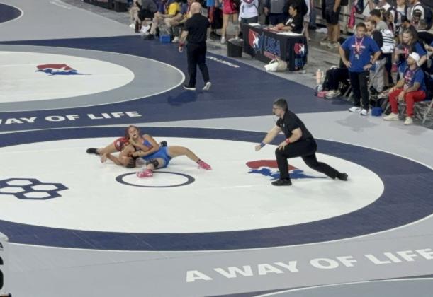 Kylei Gokey of Tecumseh makes a pin during one of her matches at the U.S. Marine Corps 16U and Junior National Tournament in Fargo, ND, July 12-13. Gokey qualified to be on Team Oklahoma at the Southern Plains Regionals and at the Oklahoma State Wrestling Tournament, and the 16U Oklahoma team placed third. Photo provided