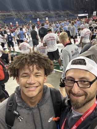 Shawnee High School Head Wrestling Coach Andrew McCune takes a selfie with Kade Carter who qualified for Team Oklahoma and competed in the U.S. Marine Corps 16U and Junior National Tournament in Fargo, ND, July 10-19. Carter wrestled in the Junior Boys - Greco-Roman division in the 150 weight class. Photo provided