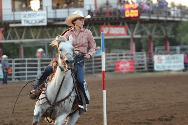 Brenna Beauchamp of Wanette makes her second run in the pole bending at the International Finals Youth Rodeo, held at the Heart of Oklahoma Expo Center on the evening of July 9. She also competed in the barrel racing.