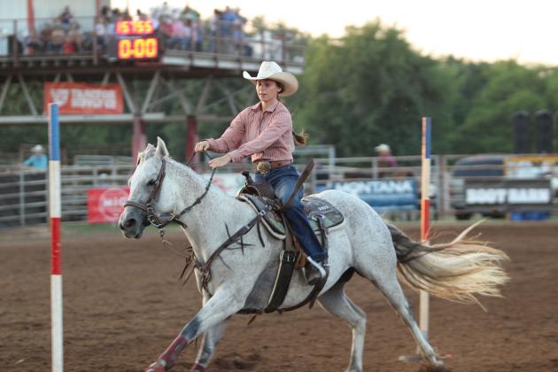 Brenna Beauchamp of Wanette makes her second run in the pole bending at the International Finals Youth Rodeo, held at the Heart of Oklahoma Expo Center on the evening of July 9. She also competed in the barrel racing.