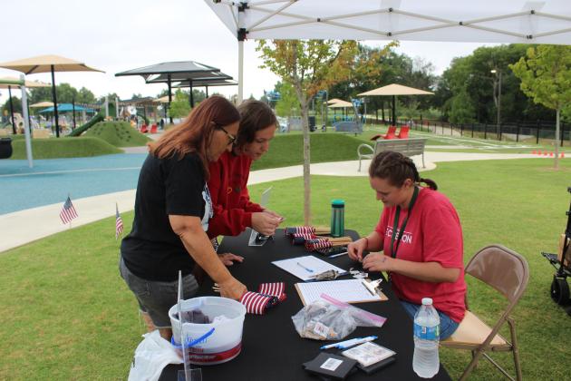 Parks and Recreation Aide Shaylee Crowder registers children for Freedom Fest.