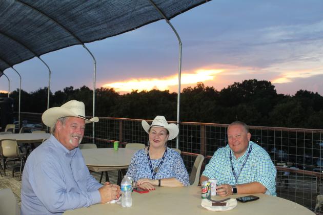Randy and Suzanne Gilbert and State Representative Dell Kerbs take a break during the opening night of the IFYR on July 6.