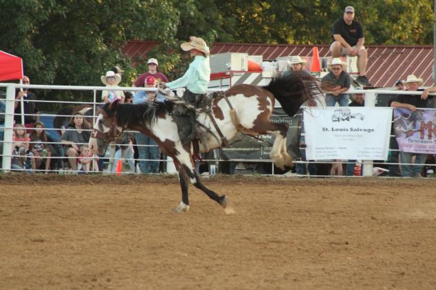 Gage Price rides Dreamcatcher in the Saddle Bronc event during the 79th Annual Maud Roundup Rodeo on July 19.