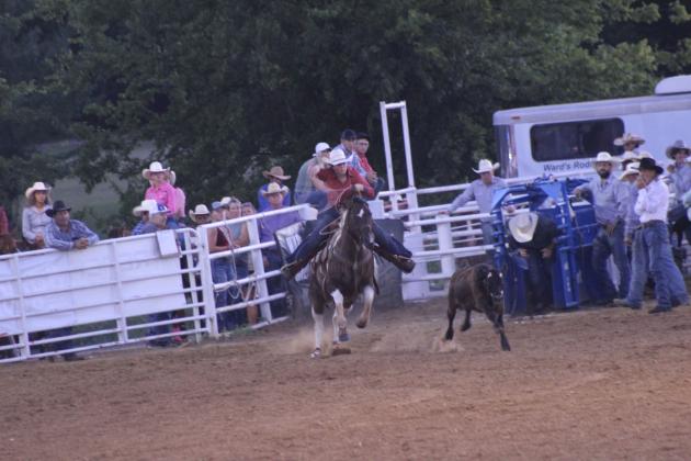 Taycee Renick of Kingston aims at her calf in the Breakaway event of the 79th Annual Maud Roundup Rodeo on July 19 and achieved her goal in 4.8 seconds.