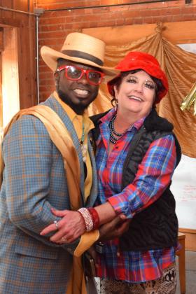 Emcee Jamelle Payne poses with Rags 2 Runway Event coordinator, Fran Topping.  Payne got the pleasure of being fashioned by Topping for the evening.  Topping was fashioned by co-planner, Dave Thomas.