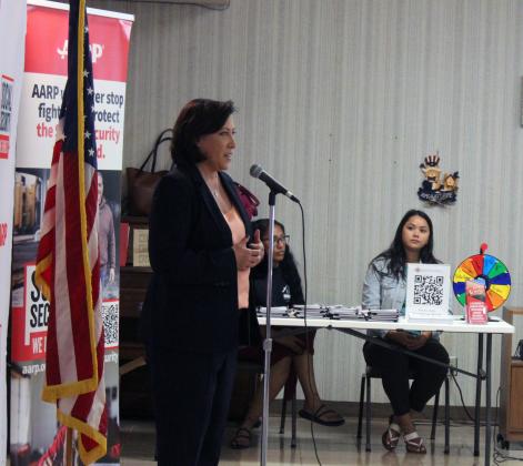 AARP Senior Associate State Director Mashell Sourjohn speaks during a ceremony celebrating the 90th Anniversary of Social Security, held at the Tecumseh Golden Age Center in conjunction with Project HEART on Aug. 12.  Also shown are Breeahnna McCarver and Tara Wallace  with the Absentee Shawnee Housing Authority.