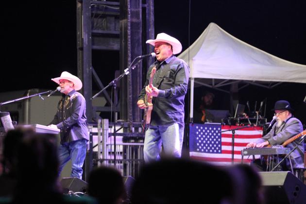 Rick Toops, Heath Wright and Larry Hight, of the band Ricochet, perform at the FireLake Fireflight Balloon Festival on Aug. 9 to round out the night. Ricochet was originally from Tulsa and had their debut hit in 1996. Craig Wayne Boyd and Jesse Keith Whitley also played that evening, and Cam Allen performed on Aug. 8.