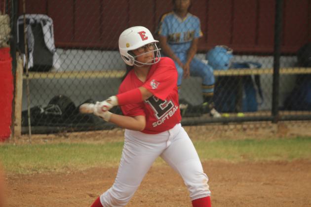Earlsboro freshman Izzie Lindsey prepares to hit a double during the home fast pitch game with New Lima on Aug. 11. The Lady Wildcats won, 10-0.