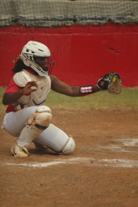 Earlsboro freshman Zory McGregor makes the catch during the home fast pitch game with New Lima on Aug. 11. The Lady Wildcats won, 10-0.