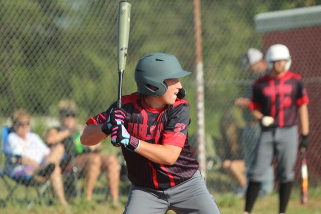 Earlsboro freshman Bentley Inman goes to bat and gets a walk during the baseball game at Macomb on Aug. 14. The Earlsboro Wildcats won, 18-0.