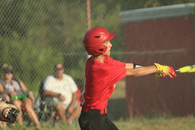 Macomb sophomore Kaden Richardson takes a swing before getting to walk during the home baseball game against Earlsboro on Aug. 14.