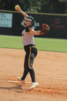 Tecumseh junior Jacee Townsend aims for home on Sept. 4.